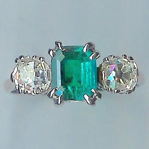 An Exceptional Emerald & Diamond 3-Stone Ring